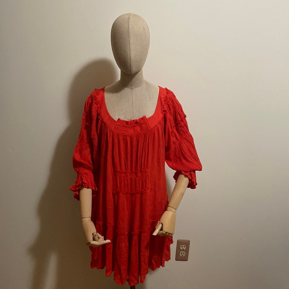 Free People Small /P orange long sleeve top. D7
